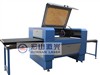 Laser cutting machine with movable work table 